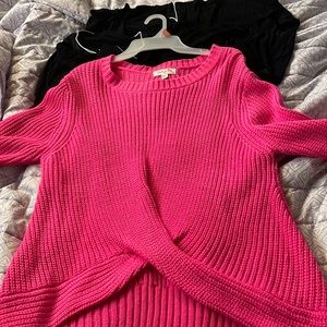 Bright pink sweater. Cropped in front. Very cute and trendy